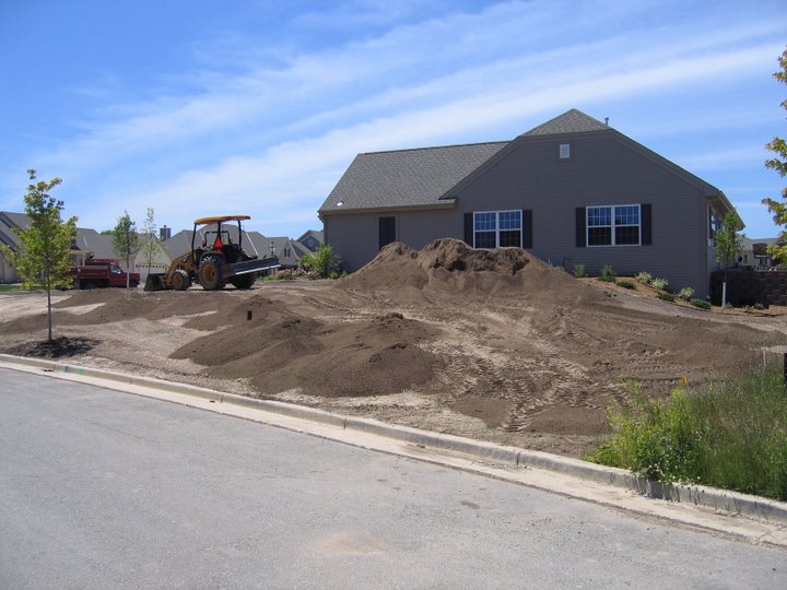 This yard is ready for seeding or sodding after being graded by Bob's Grading. - Bob's Grading Muskego